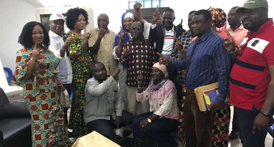 Freddie Blay poses with the party executives in Tamale