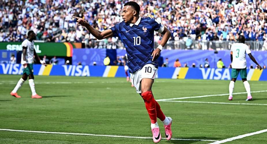 Kylian Mbapp became Frances all-time record scorer after hitting a brace against Senegal in their World Cup opener. -  Dylan Martinez, Reuters
