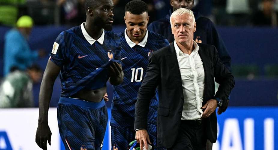 Frances forward #10 Kylian Mbappe and head coach Didier Deschamps react after winning the 2026 World Cup Group I football match between France and Iraq at the Philadelphia Stadium on June 22, 2026. -  Jewel Samad, AFP
