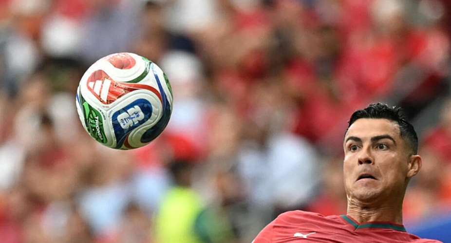 Portugals forward #07 Cristiano Ronaldo controls the ball during the 2026 World Cup Group K football match between Portugal and Uzbekistan at the Houston Stadium in Houston on June 23, 2026. -  Paul Ellis, AFP