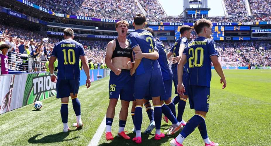 Ermin Mahmic celebrates with his Bosnia and Herzegovina teammates after scoring the crucial third goal that sealed their 3-1 victory over Qatar and boosted their knockout hopes. -  Blake Dahlin, Reuters