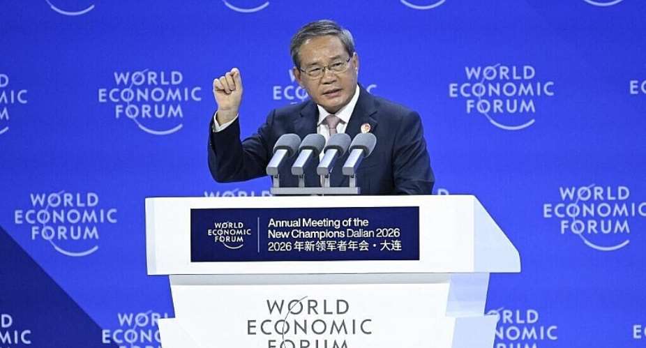 Chinese Premier Li Qiang addresses the opening of the World Economic Forum (WEF) in Dalian on June 24, 2026. -  Wang Zhao, AFP