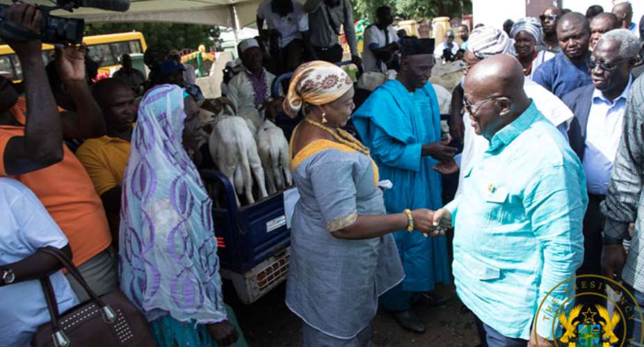 President Akufo-Addo interacting with one of the farmers at the event