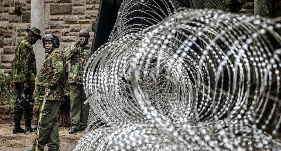 Police put up heavy protection around government buildings. -  Luis TATO / AFP