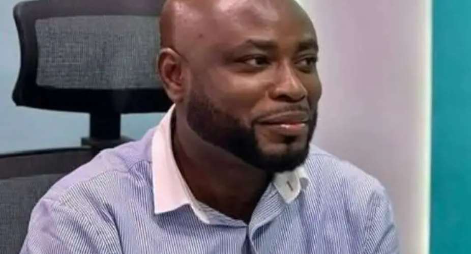 Larry Alans Dogbe, Managing Editor of The Herald Newspaper