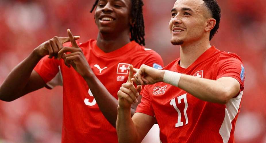 Ruben Vargas (right) and Johan Manzambi (left) scored in Switzerlands 2-1 win over Canada. The victory allowed them to move into the last 32 knockout stages as winners of Group B. - REUTERS - Lee Smith