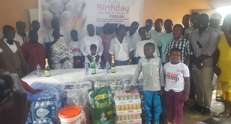Mr. Twum Yeboah in white kaftan donated to the Orphanage home in his birthday