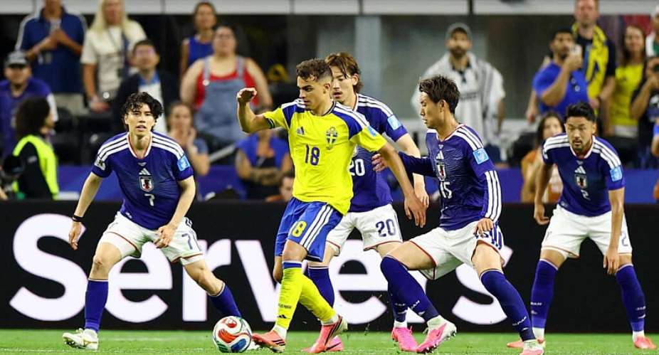 Swedens Yasin Ayari in action with Japans Ao Tanaka, Ayumu Seko and Daichi Kamada. -  Issei Kato, Reuters