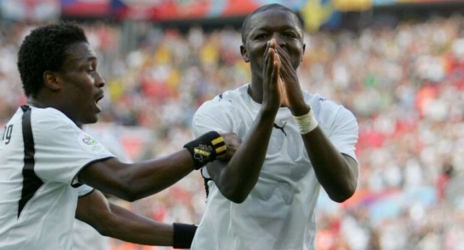 COLOGNE, GERMANY - JUNE 17: Sulley Muntari 11 of Ghana celebrates with team mate Derek Boateng 9 afetr scoring the second goal of the game during the FIFA World Cup Germany 2006 Group E match between Czech Republic and Ghana at the Stadium Colonge on June 17, 2006 in Colonge, Germany. Photo by Jamie McDonaldGetty Images