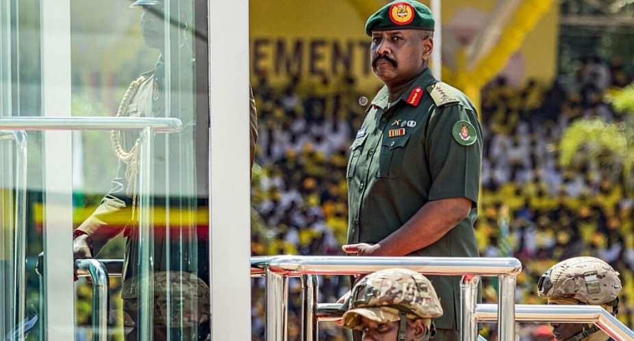 Muhoozi Kainerugaba, son of President Yoweri Museveni and Ugandas Chief of Defence Forces, inspects a military parade at the Kololo Ceremonial Grounds in Kampala on 12 May, 2026. - AFP - BADRU KATUMBA