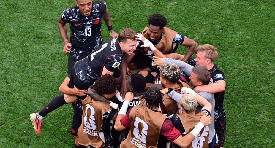 Canadas team embraces on the pitch after a World Cup win against South Africa on June 28, 2026. -  Frederic J. Brown, AFP