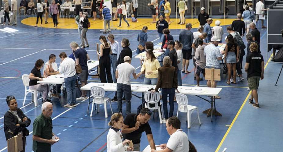 DPeople cast their vote at the Salle Omnisports polling station in Noumeas Anse Vata district during provincial elections, in Noumea, New Caledonia, on June 28, 2026. -  Delphine Mayeur, AFP