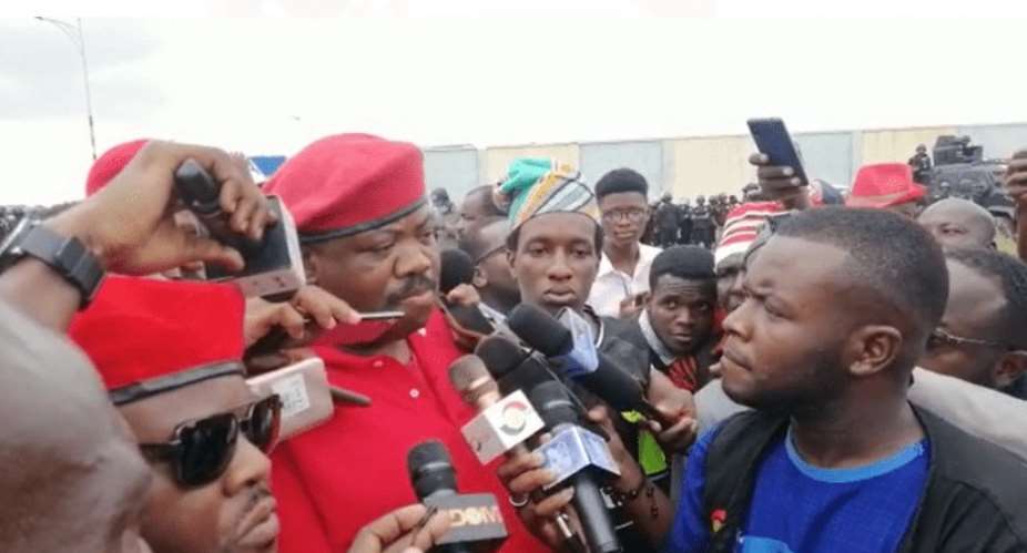 NDC's Joshua Akamba carries gun to Arise Ghana demo