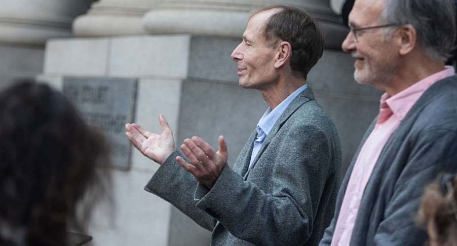 Right to die activist Sean Davison (left) speaks to the press after three years of house arrest. - Source: Brenton Geach/Gallo Images via Getty Images