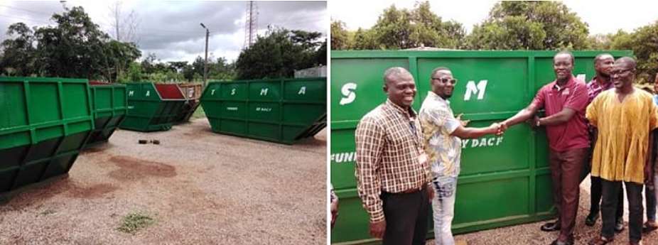 MCE Hon. Emmanuel Kwame Frimpong handing over skip containers to assembly member