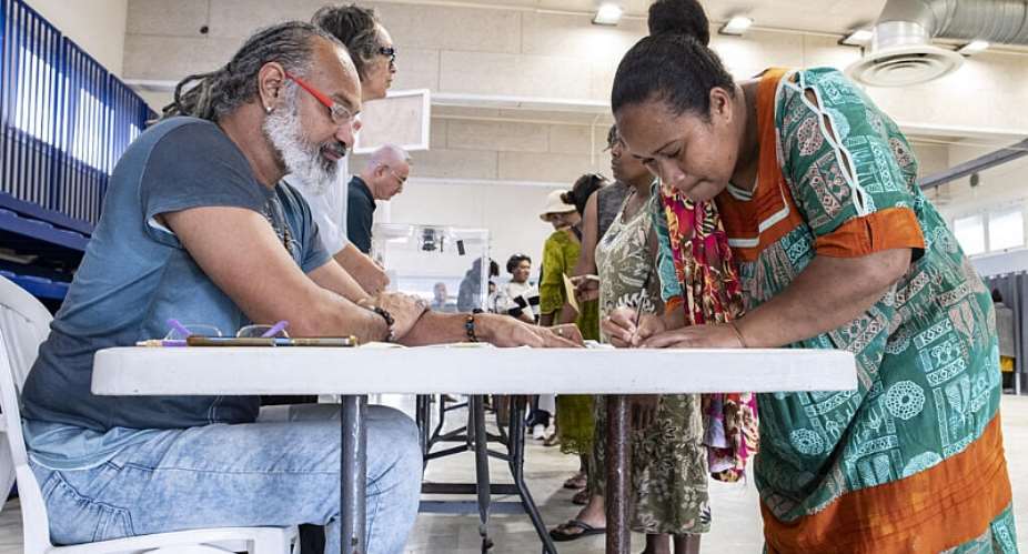 People vote at the Veyret-Kafoa polling station during New Caledonias provincial elections in the Riviere Salee neighbourhood of Noumea, New Caledonia, on 28 June 2026. - AFP - DELPHINE MAYEUR