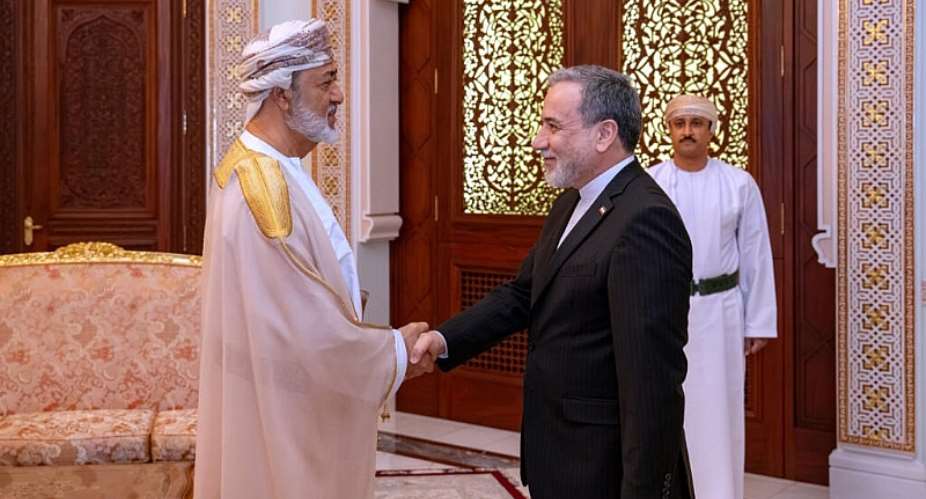 Omans Sultan Haitham bin Tariq (left) shakes hands with Iranian Foreign Minister Abbas Araghchi in Muscat, on 26 April, 2026. Oman has a long record of being a key broker between Iran and the West. - AP