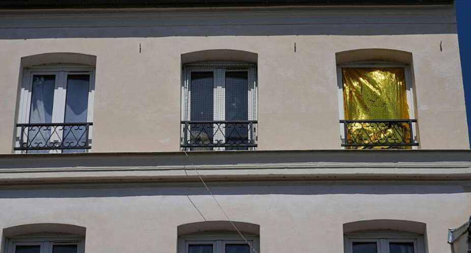 A thermal blanket covers a window to help keep out the heat during a heatwave in Saint-Germain-en-Laye, west of Paris, on June 25, 2026. -  Michel Euler, AP
