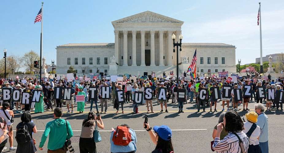 Demonstrators hold letters making up the slogan Born in the USA = citizen! outside the US Supreme Court building in Washington, DC, US, April 1, 2026. -  Kylie Cooper, Reuters