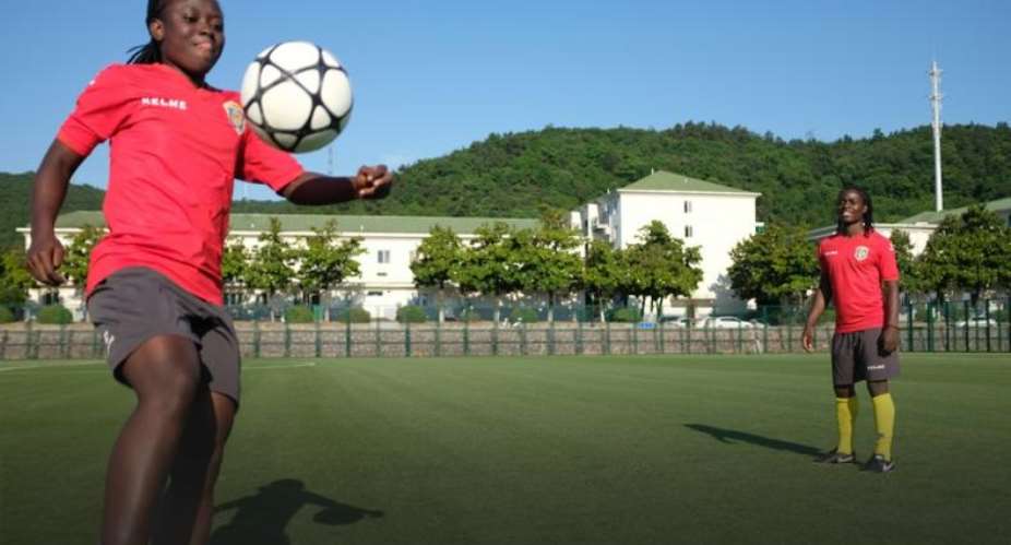 African 'Twin Sisters' Tackle Chinese Football Together
