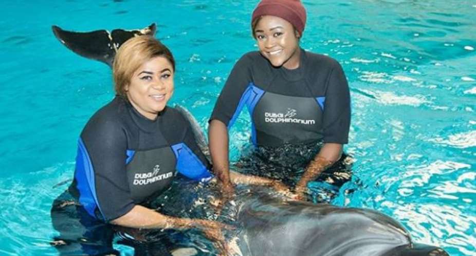 Actresses, Iheme Nancy, Uju Okoli Enjoys Vacation with Dolphin in Dubai