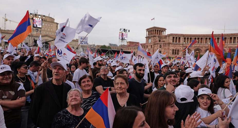 Supporters of Russian-Armenian tycoon Samvel Karapetyan attend a rally with Armenian national flags against incumbent Prime Minister Nikol Pashinyan at Republic Square in Yerevan, Armenia, on June 3, 2026. -  Anthony Pizzoferrato, AP