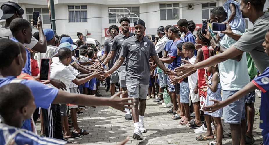 Fans gathered to greet the Cape Verde players for a training session in Cape Verde before the national squad left for the 2026 World Cup in the United States, Mexico and Canada. - AFP - PATRICK MEINHARDT
