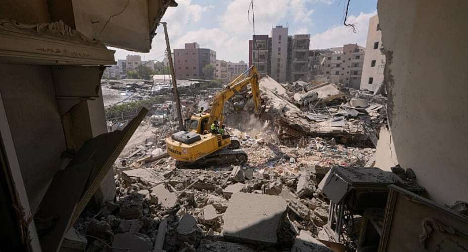Rescue workers use an excavator as they search for victims under the rubble of a building that was hit in an Israeli air strike on Monday in the southern port city of Tyre, Lebanon, June 2, 2026. -  Mohammed Zaatari, AP