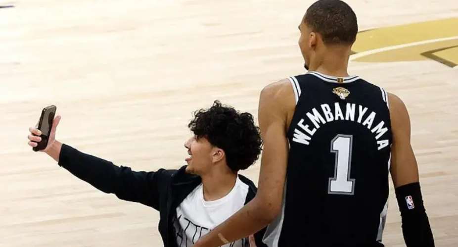 Getty ImagesImage caption: The court invader will be banned from all NBA arenas for life