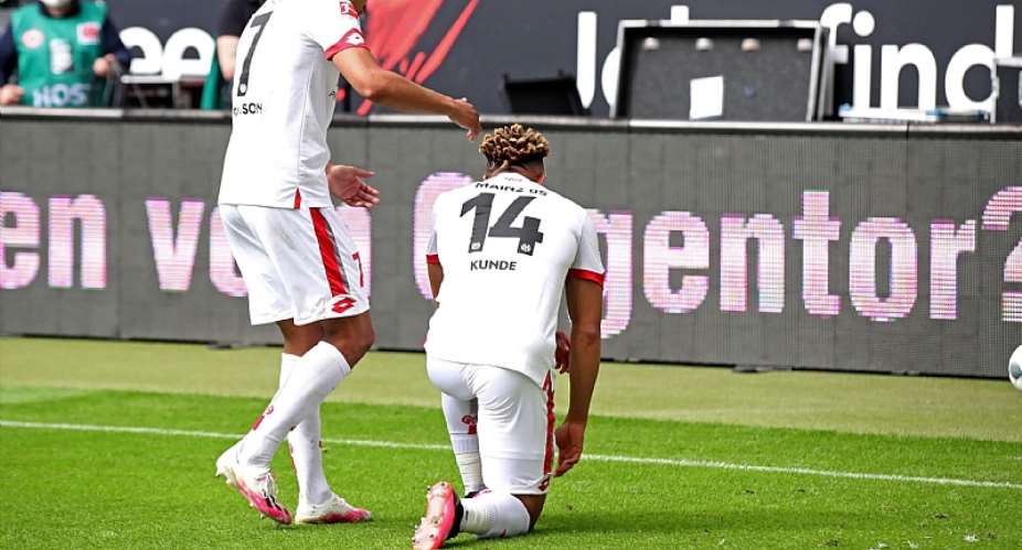 Pierre Kunde Malong of 1. FSV Mainz 05 is joined by Robin Quaison as he knees down to celebrate after scoring his team's second goal during the Bundesliga match between Eintracht Frankfurt and 1. FSV Mainz 05 at Commerzbank-Arena on June 06, 2020 in FrankImage credit: Eurosport