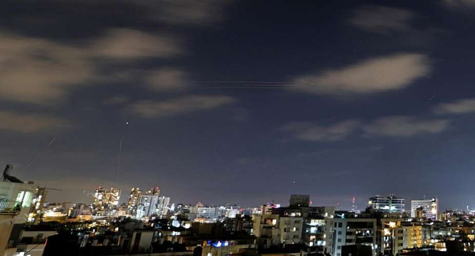 Rocket trails are seen in the sky above the Israeli coastal city of Netanya on June 7, 2026 after Iran launched missiles at Israel. -  Jack Guez, AFP