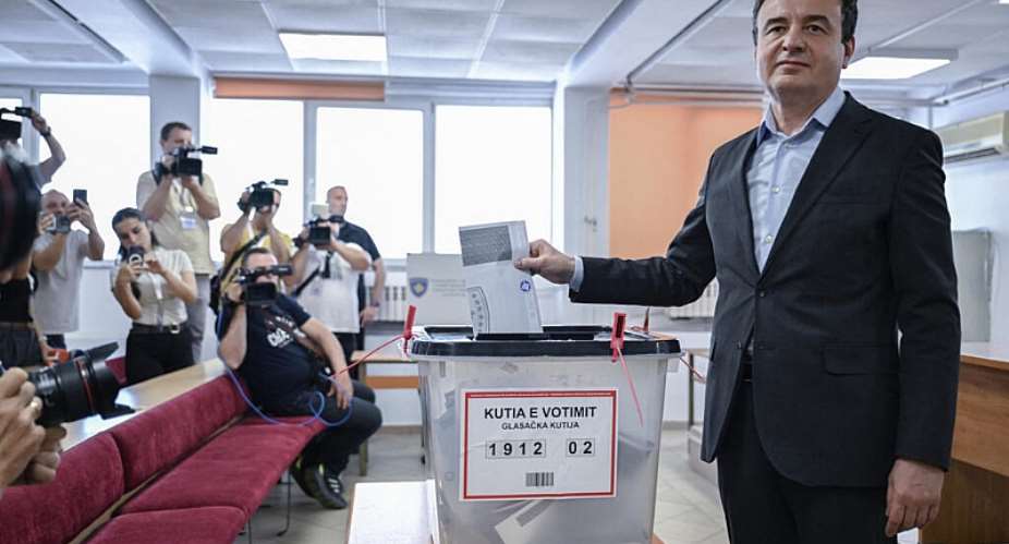 Kosovos Prime Minister Albin Kurti casts his ballot at a polling station on the day of general elections in Pristina on 7 June 2026. - AFP - ARMEND NIMANI