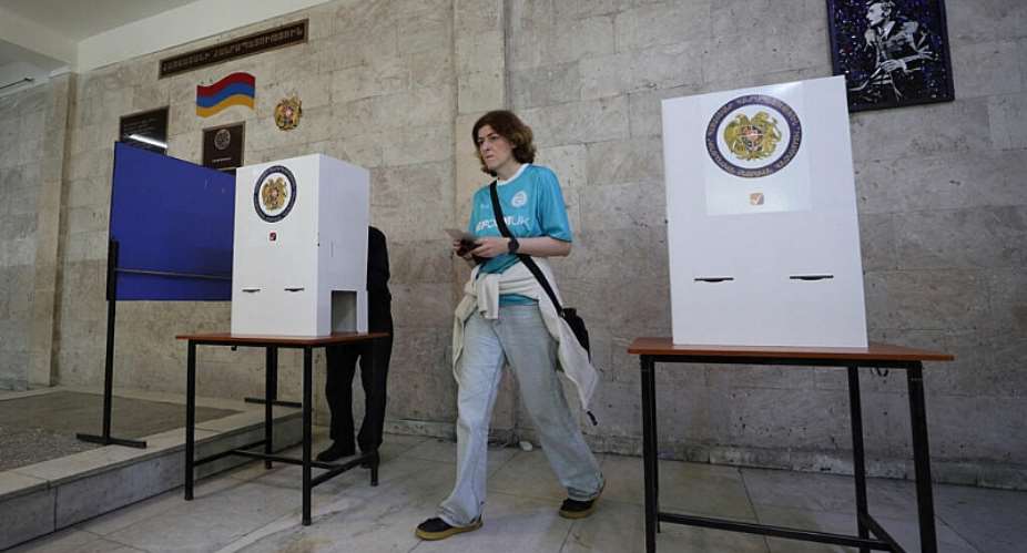 Voters visit a polling station during a parliamentary election in Yerevan, Armenia on June 7, 2026. -  Vahram Baghdasaryan, via Reuters