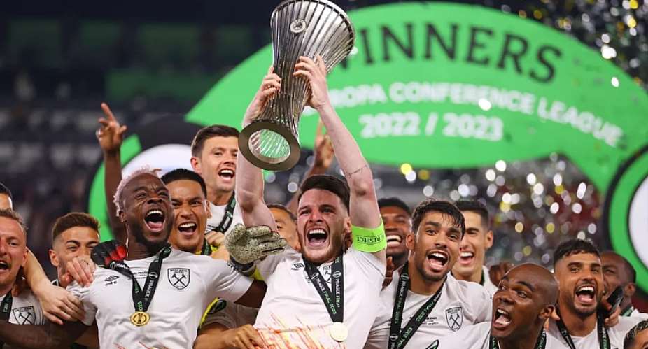 Declan Rice of West Ham United lifts the UEFA Europa Conference League trophy after the teams victory during the UEFA Europa Conference League 2022/23 final match between ACF Fiorentina and West Ham United FC at Eden Arena.Image credit: Getty Images