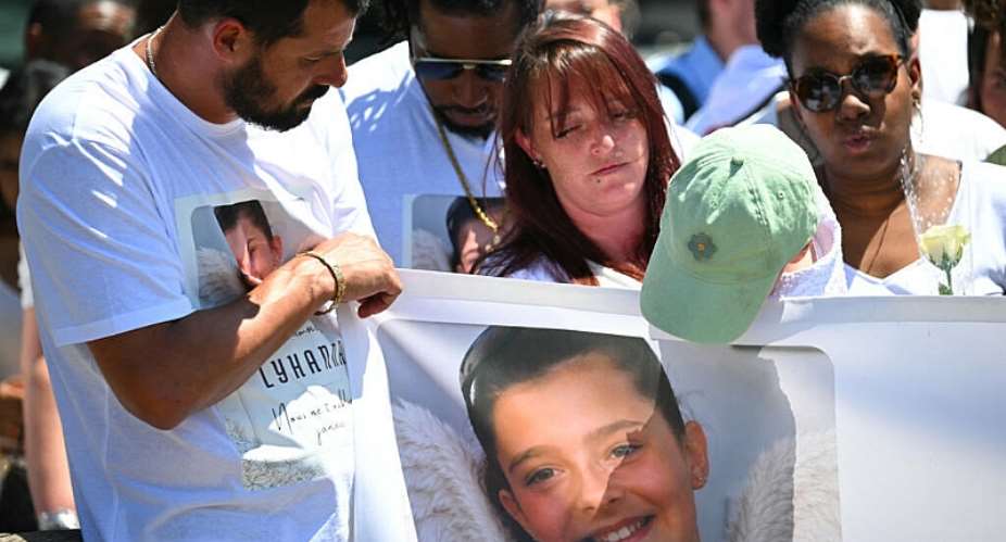 The parents of murdered 11-year-old schoolgirl Lyhanna take part in a silent march in her hometown of Fleurance, in southwest France, on June 7, 2026. -  Lionel Bonaventure, AFP