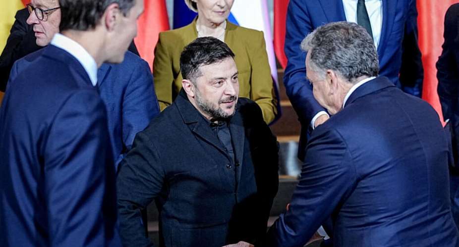 FILE - Ukraines President Volodymyr Zelensky and U.S. Special Envoy Steve Witkoff talk to each other as Jared Kushner, the son-in-law of U.S. President Donald Trump, and European Commission President Ursula von der Leyen look on. -  Kay Nietfeld, Reuters