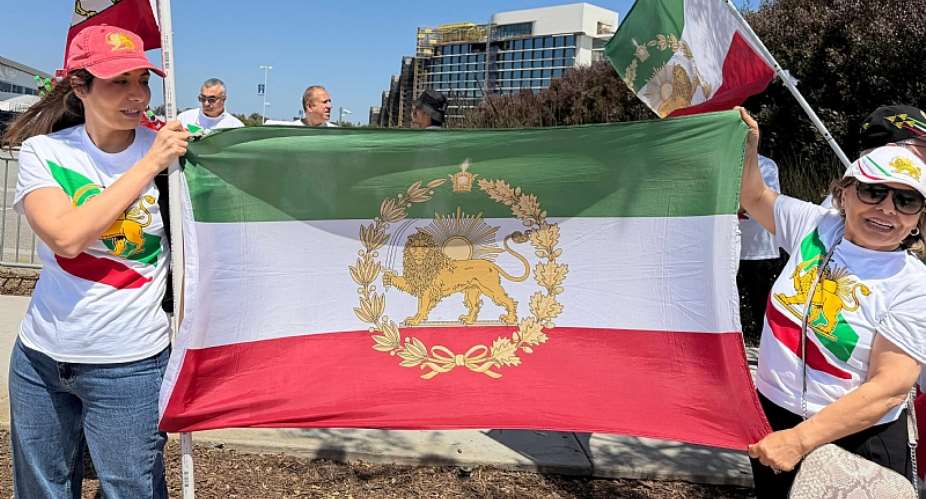 The flag of the pre-1979 Islamic revolution, featuring a lion and a sun, is banned from stadiums at the World Cup
