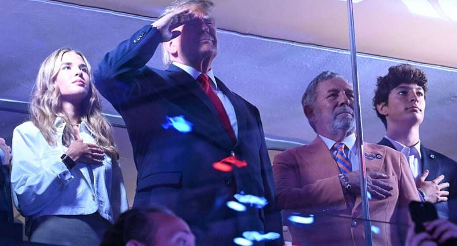 A loud wave of boos met Trump as he appeared on the screen during the singing of the national anthem. -  Saul Loeb, AFP