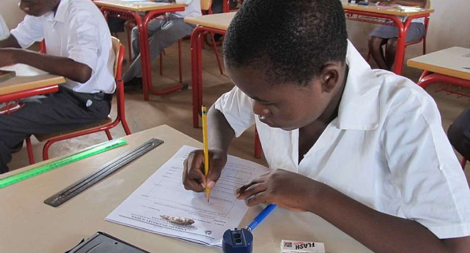 Students writing exams - chronicle.co.zw