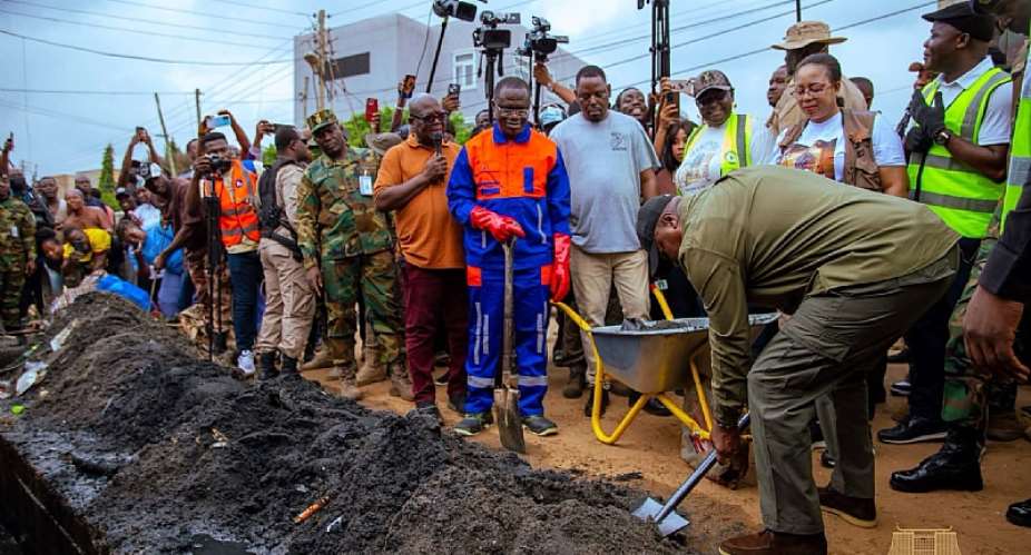 President John Dramani Mahama participating in a national clean up exercise in Tse Addo