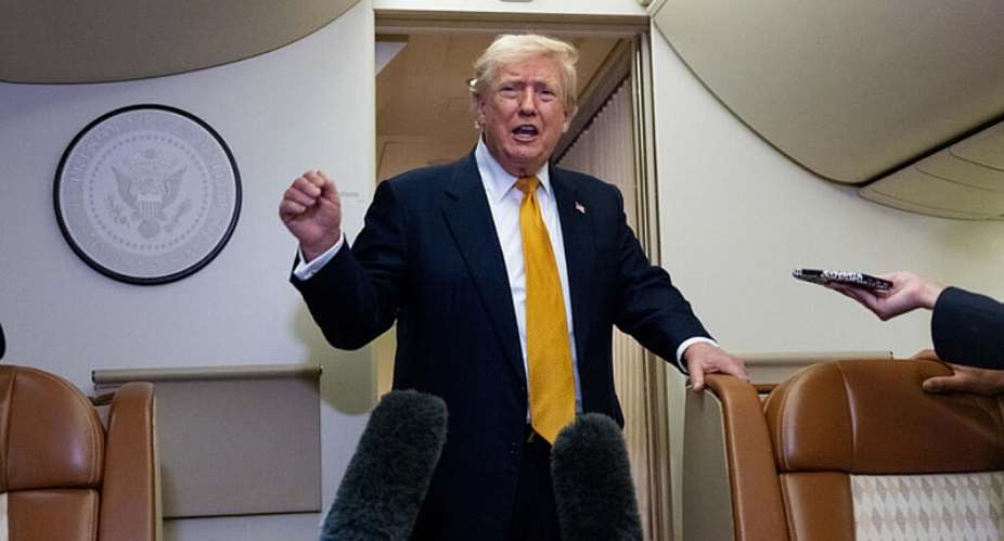 US President Donald Trump speaks with reporters aboard Air Force One after landing at the US Air Force Base at RAF Mildenhall in Suffolk, England, July 8, 2026. -  Alex Brandon, AP