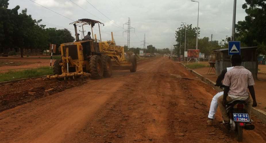 Workers busily constructing road in the area