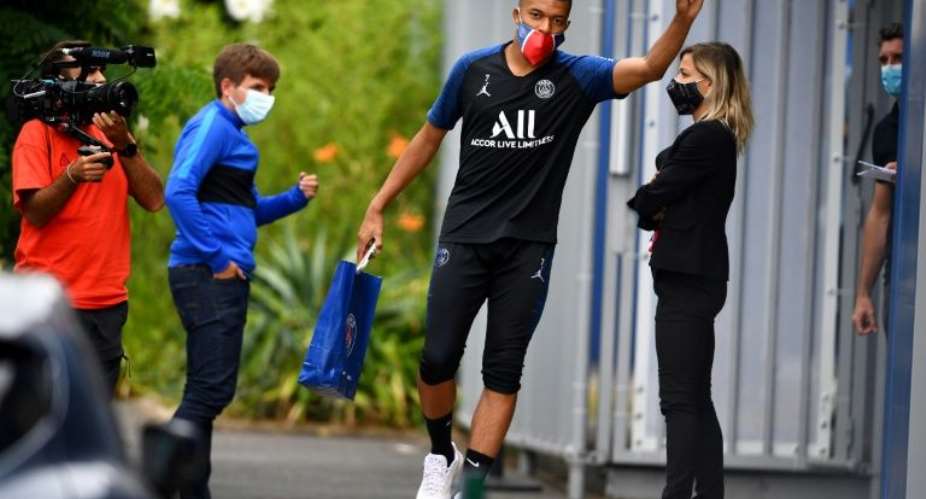 Paris Saint-Germain forward Kylian MBappe waved as he arrived for a training session and will get to play in front of fans at Le Havre on Sunday AFP PhotoFRANCK FIFE