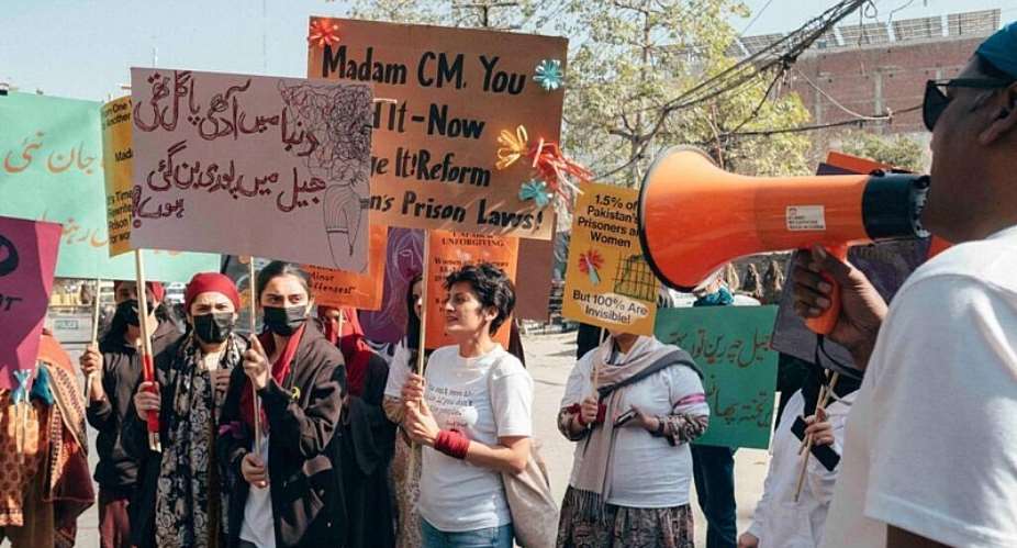Sarah Belal (centre), founder of the Justice Project Pakistan, marches in Lahore to raise awareness about outdated prison laws for women in Punjab, Pakistan. -  JPP