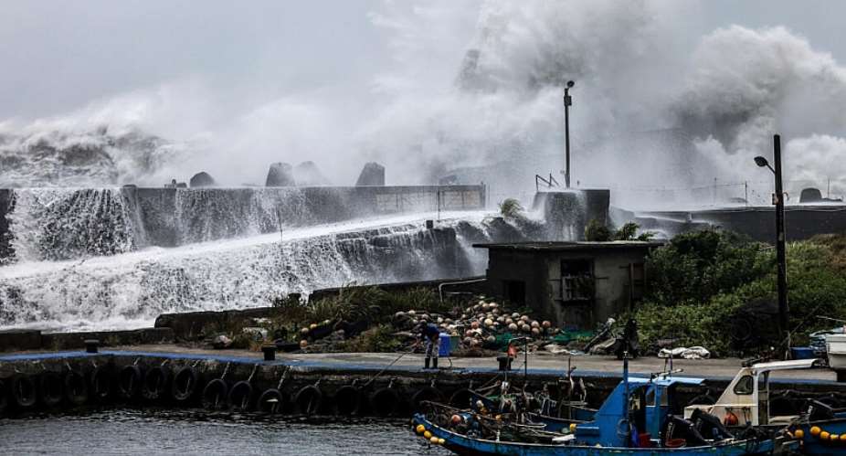 Bavi has whipped up strong winds and dumped heavy rain. -  I-Hwa Cheng, AFP