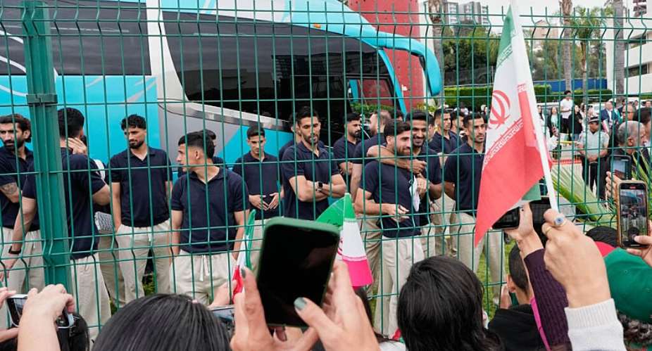 Fans salute Irans Team Melli as they leave their hotel in Tijuana, on June 30, 2026. -  Gregory Bull, AP