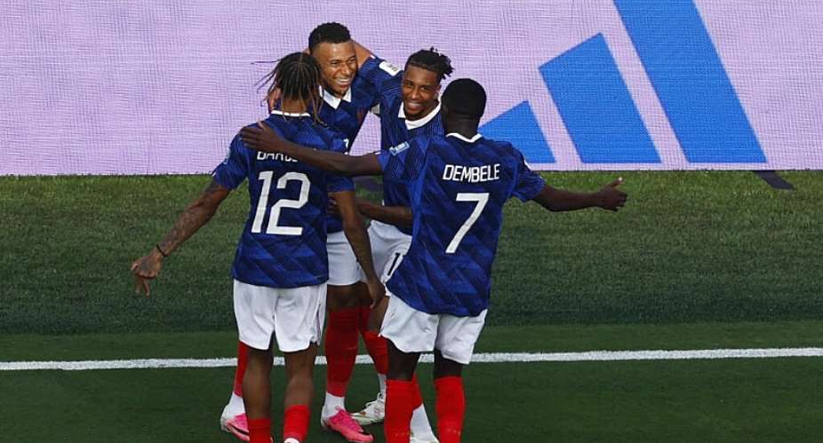 Frances Kylian Mbappe celebrates scoring their third goal with teammates. -  Jeenah Moon, Reuters