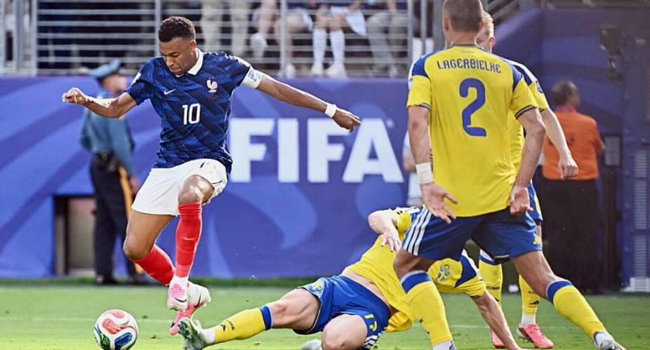 Kylian Mbappe scores Frances opener in their win over Sweden on Tuesday which took them into the World Cup last 16 -  Jewel SAMAD / AFP