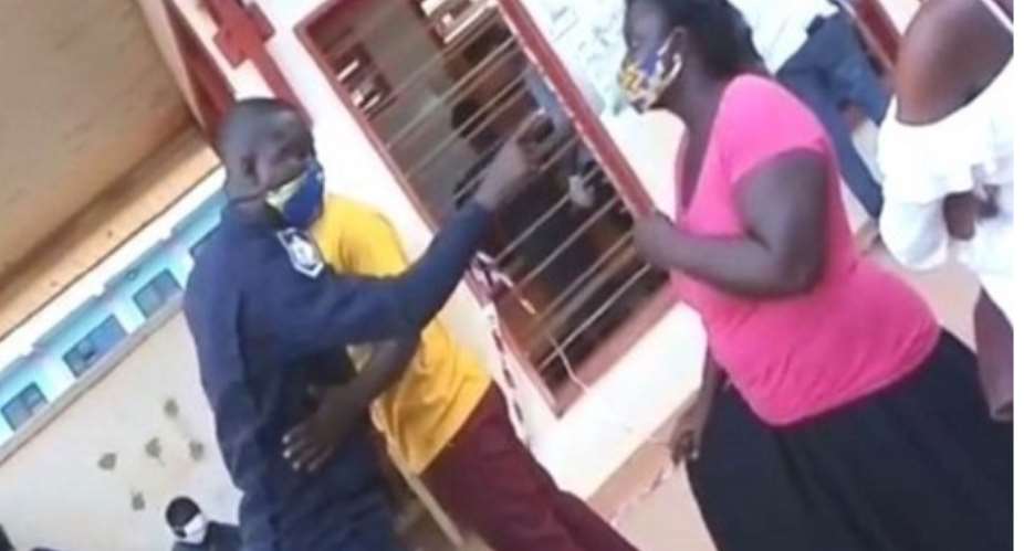 Policeman In Trouble After Slapping A Woman At Voter Registration Centre