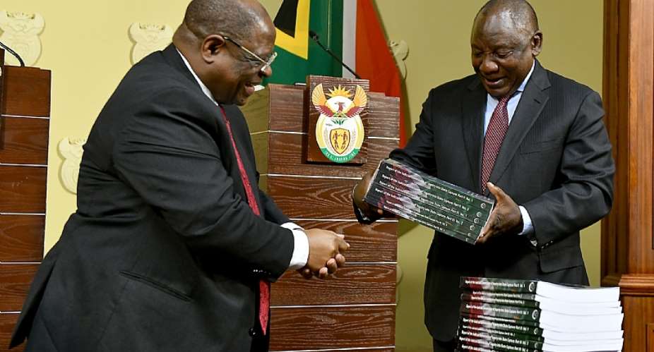 President Cyril Ramaphosa, right, receives the final State Capture Report from Chief Juistice Raymond Zondo.  - Source: GCISFlickr